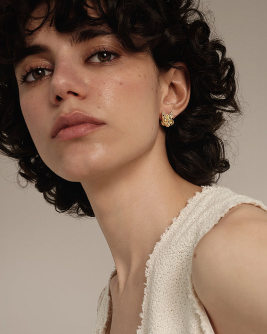 Gold earrings Lynx