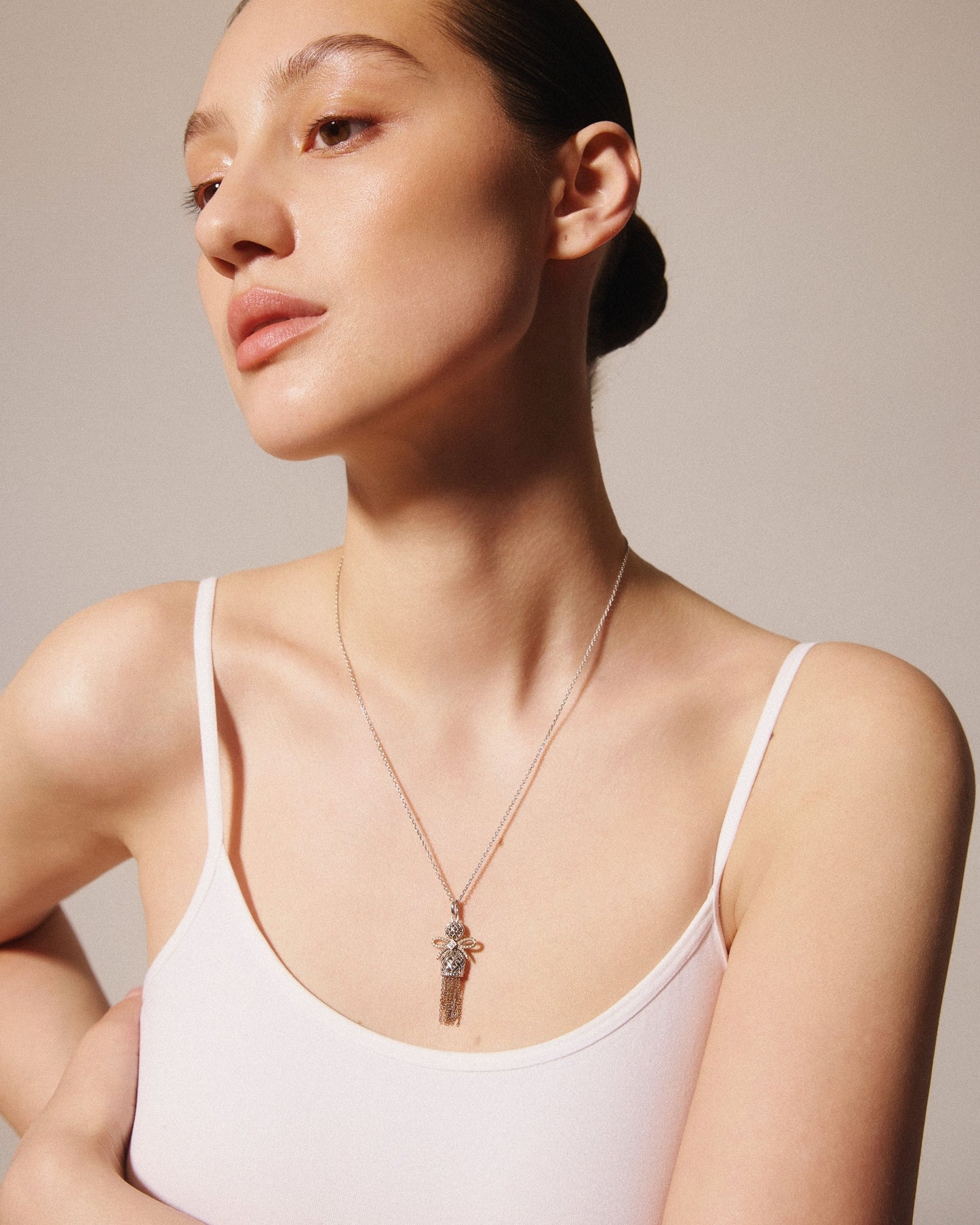 Pendentif Poupée tressée