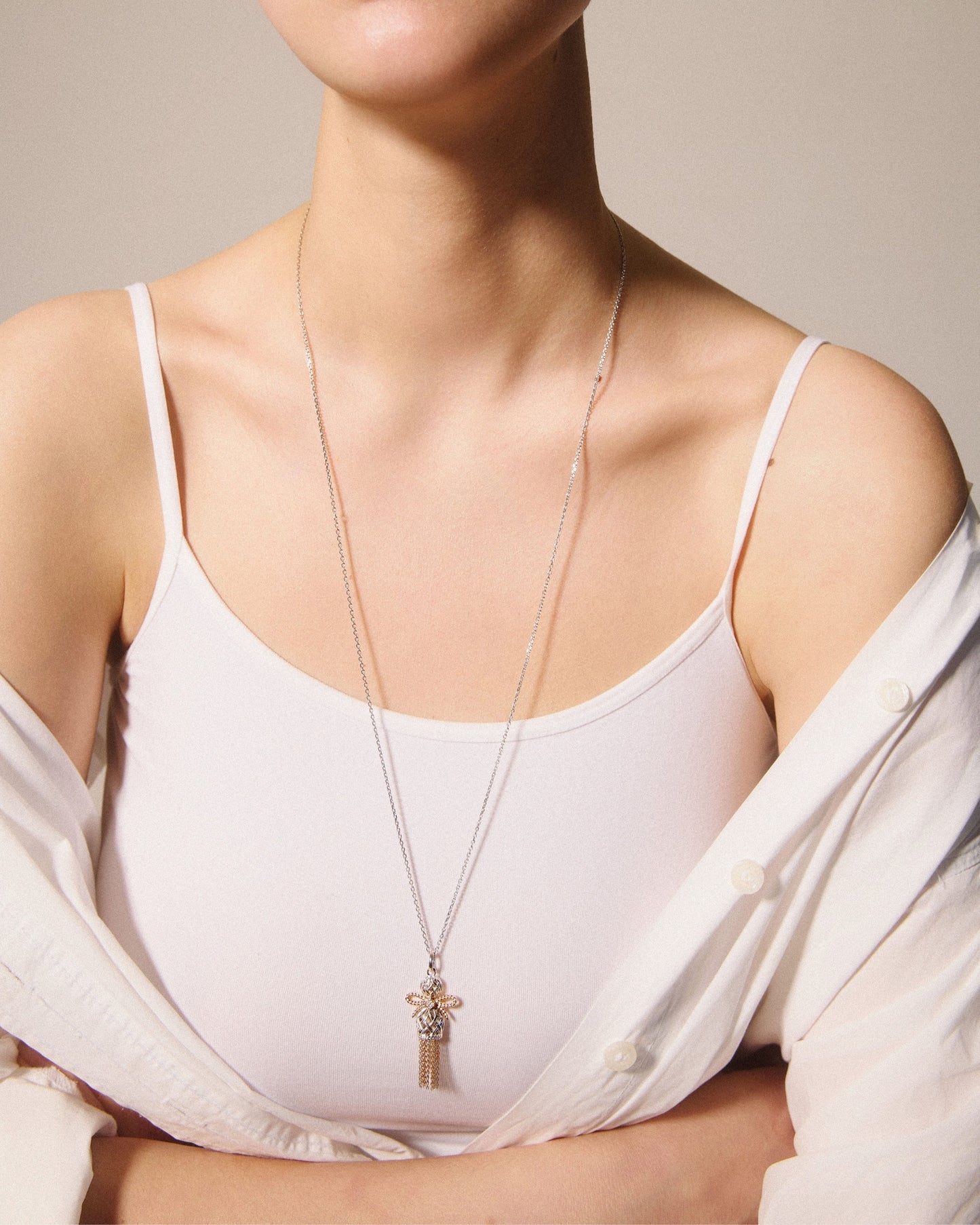 Pendentif Poupée tressée