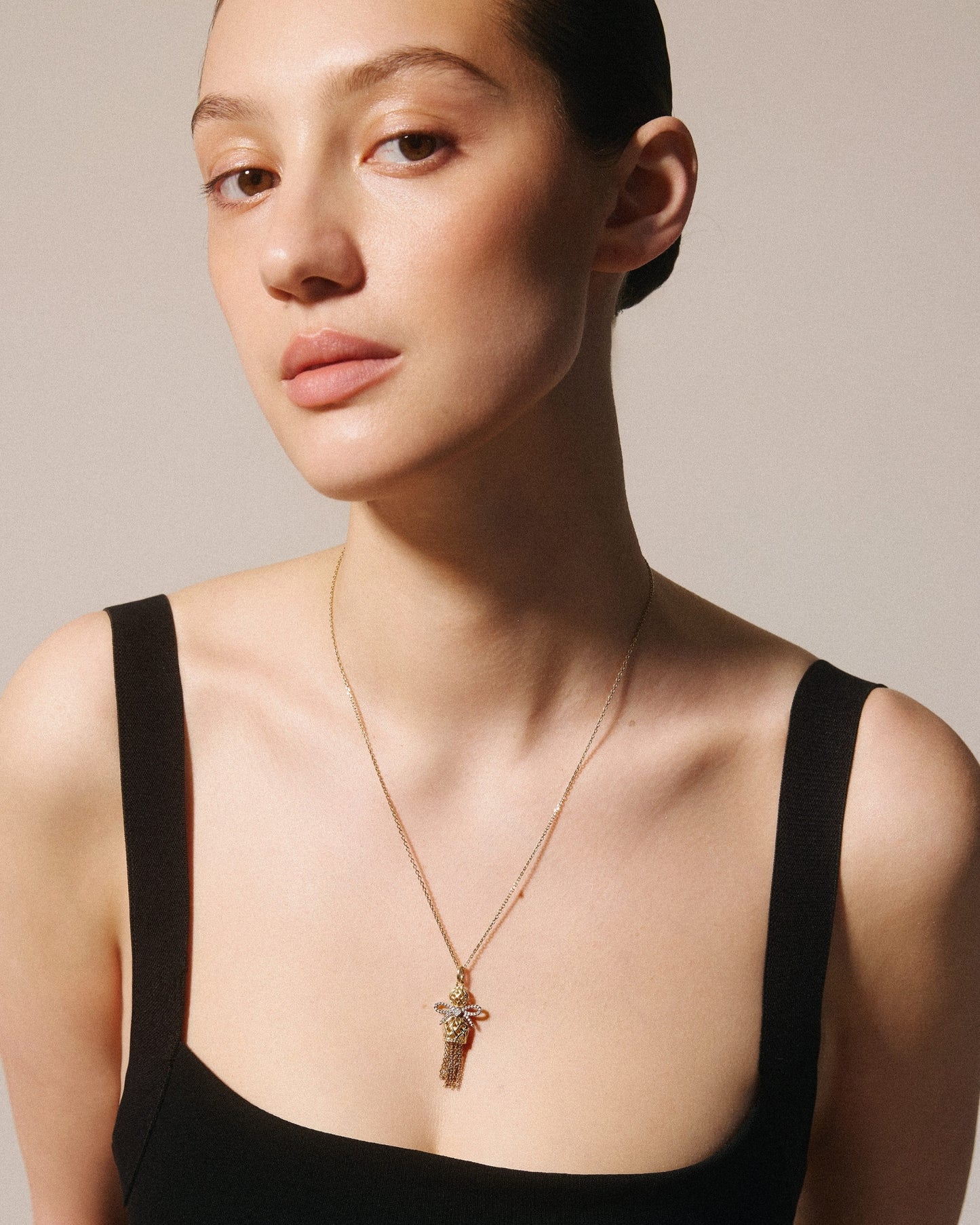 Pendentif Poupée tressée