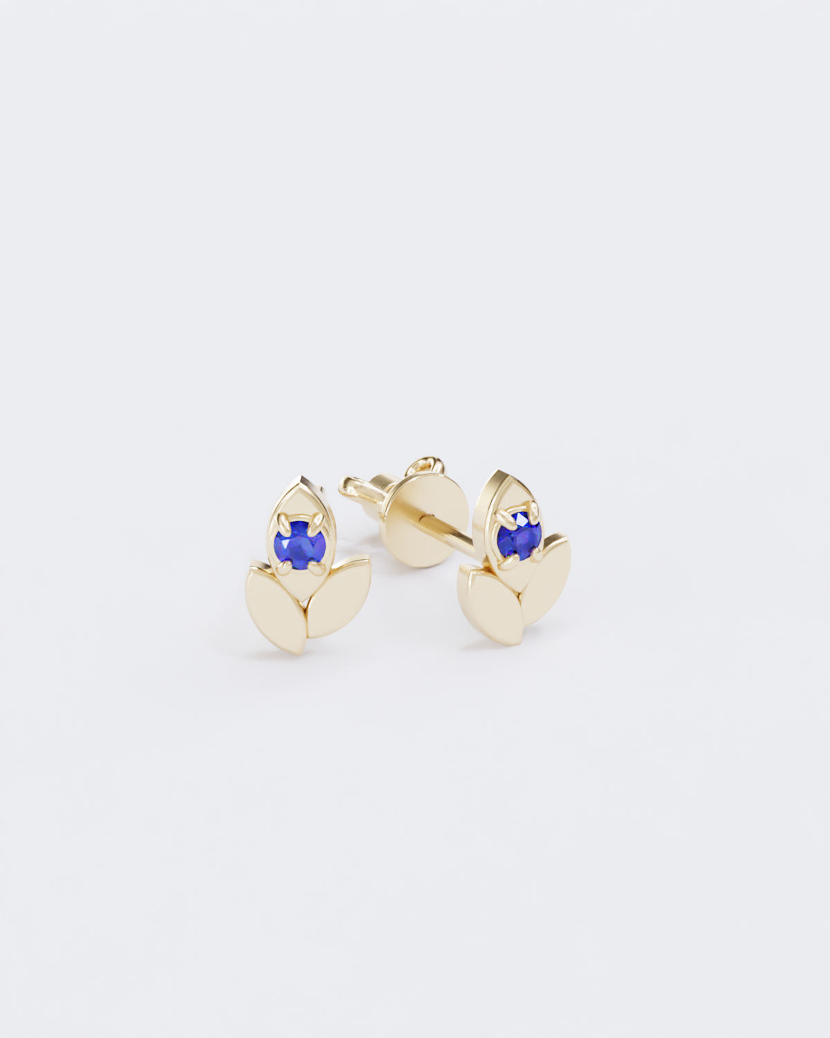 Spikelets gold piercing studs with sapphires
